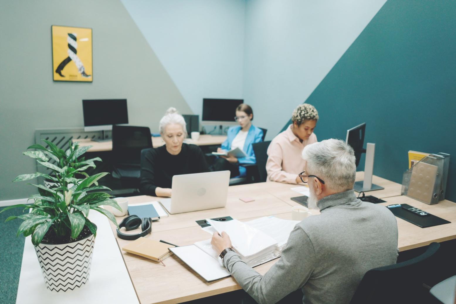 Professional development workspace showing organized planning materials and productivity tools